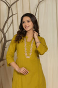 Closeup image of Olive Color Kurta Set With Silver And Pink Floral Embroidery At Neck Line From Samhitas Apparel
